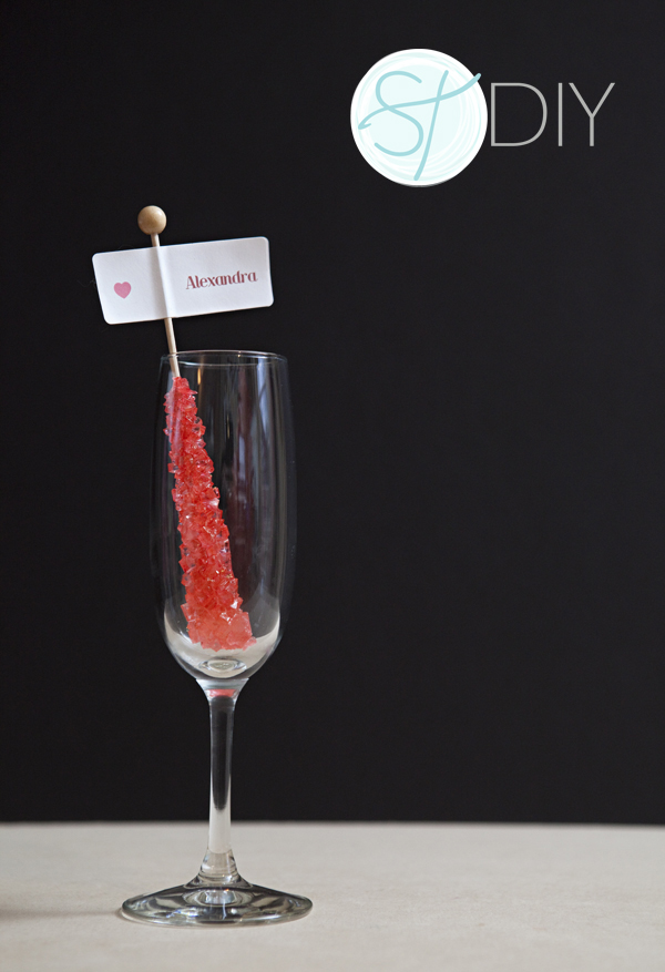 DIY Rock Candy Champagne Glass Seating Cards via Something Turquoise