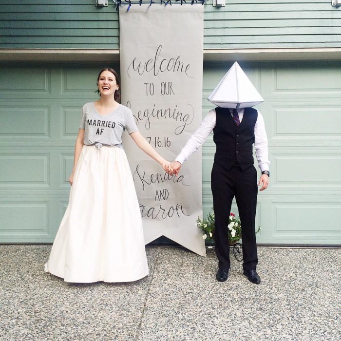 Such a funny and cute wedding photo - the bride and groom look so happy (well, the bride does! haha).