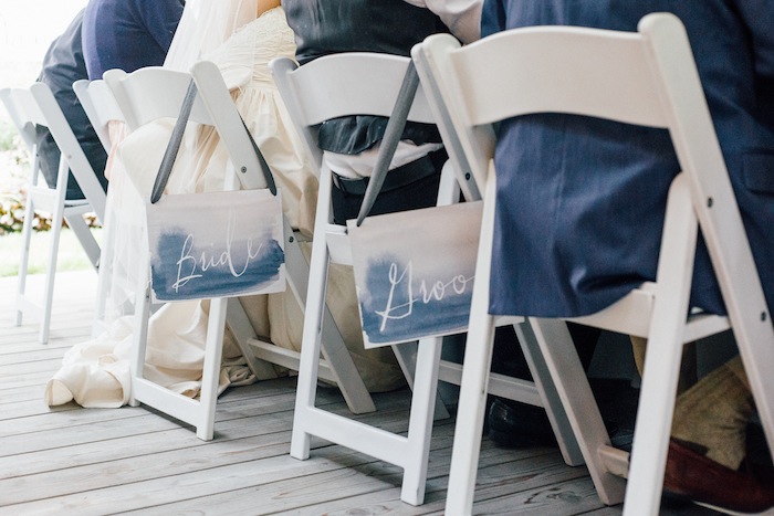 Love these free printable bride and groom chair signs.  Cheap and easy!
