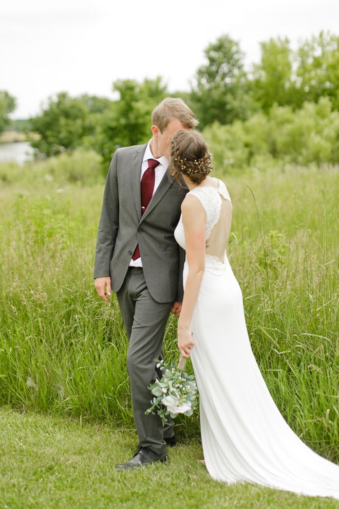 Gorgeous shot of the bride and groom kissing by The Siegers Photo and Video!