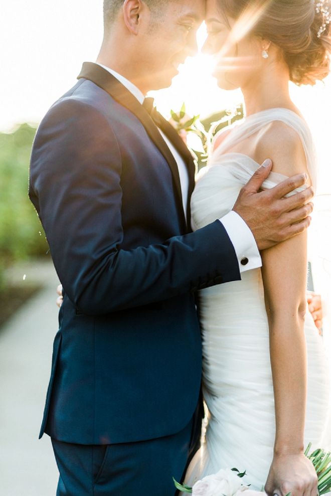 Stunning sunlit shot of the bride and groom by Shelly Anderson Photography