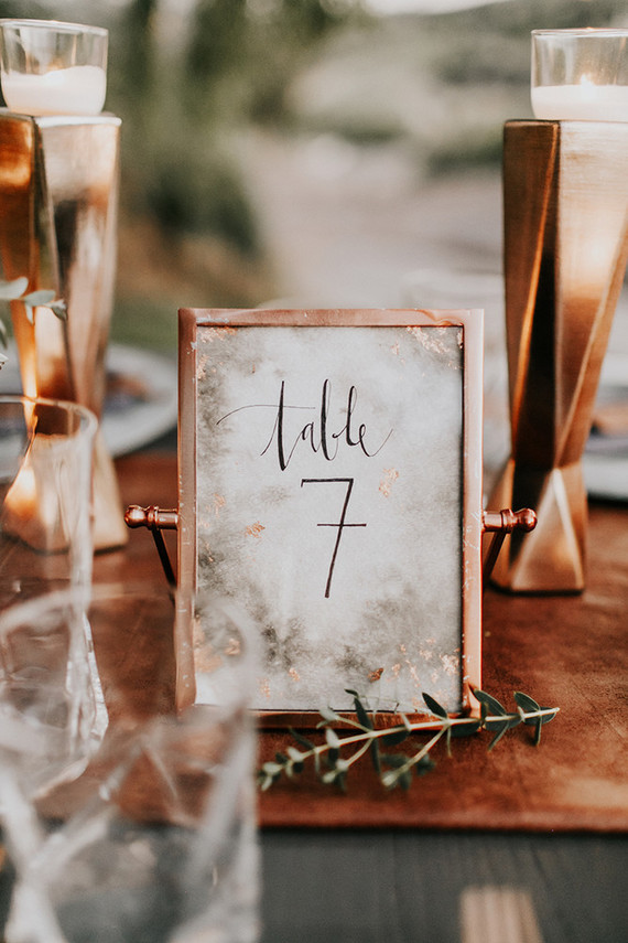 Love these unique copper table numbers for an indoor or outdoor wedding.