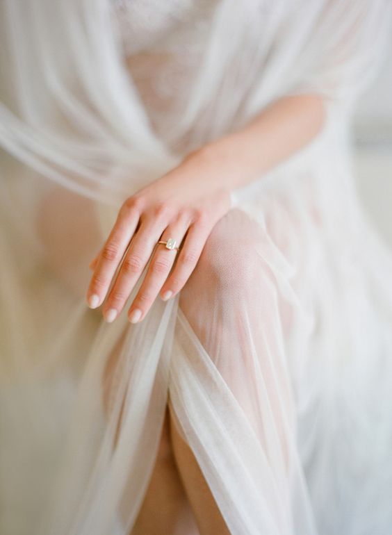 Gorgeous boudoir shot of a bride in her veil and ring by Jose Villa