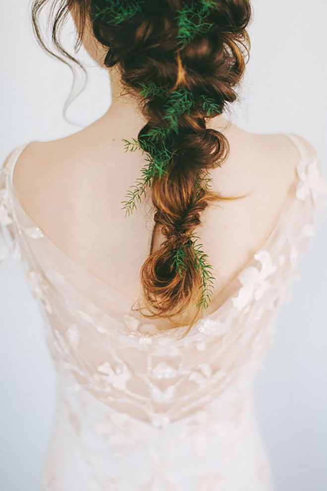 Try adding in some winter greenery to your braid.