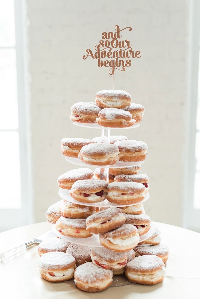 When your cake is made of cream filled donuts with a darling cake topper? You win our hearts! 