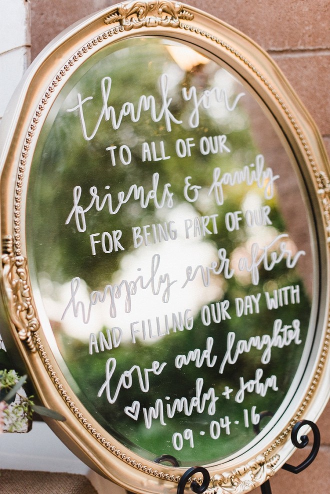 These handwritten mirrors made the perfect glam and elegant signage at this stunning vineyard wedding!