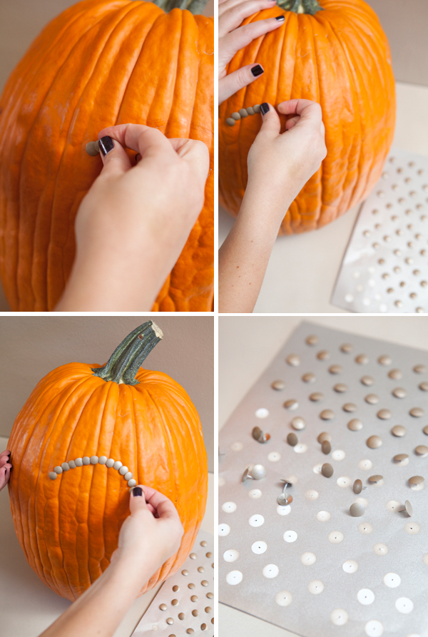 pumpkin and thumbtack table number centerpieces