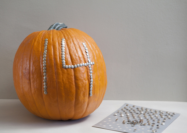 pumpkin and thumbtack table number centerpieces