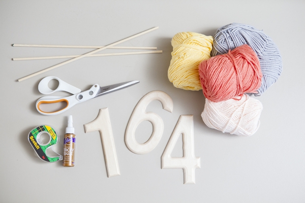 SomethingTurquoise_DIY-yarn-wrapped-table-numbers_0002.jpg