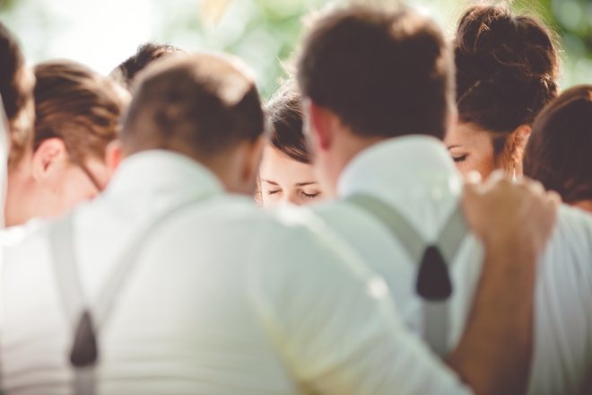 Praying during their wedding ceremony