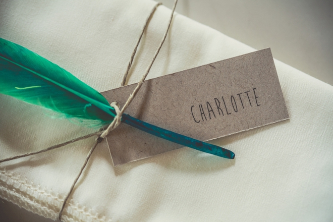 Feather and napkin seating cards
