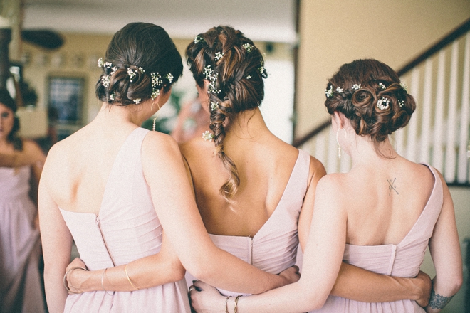 Beautiful bridesmaids with flowers in their hair