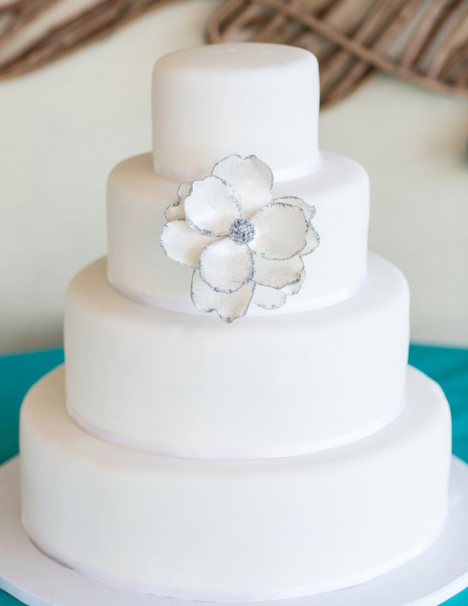 Beautiful simple white 4-tiered cake