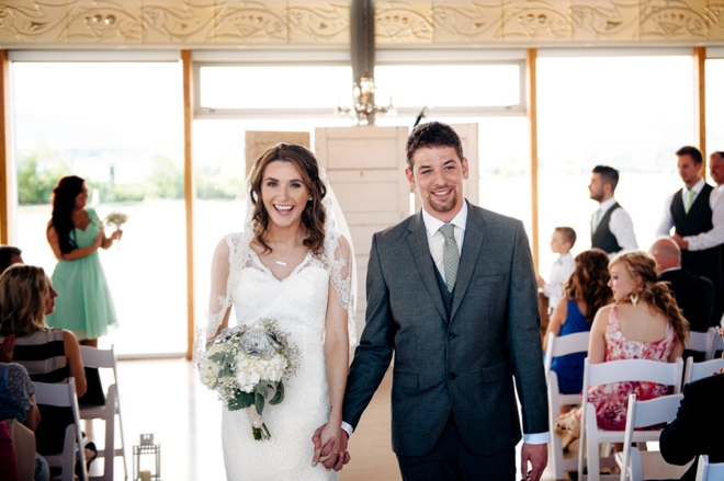 Bride and groom walking down the aisle