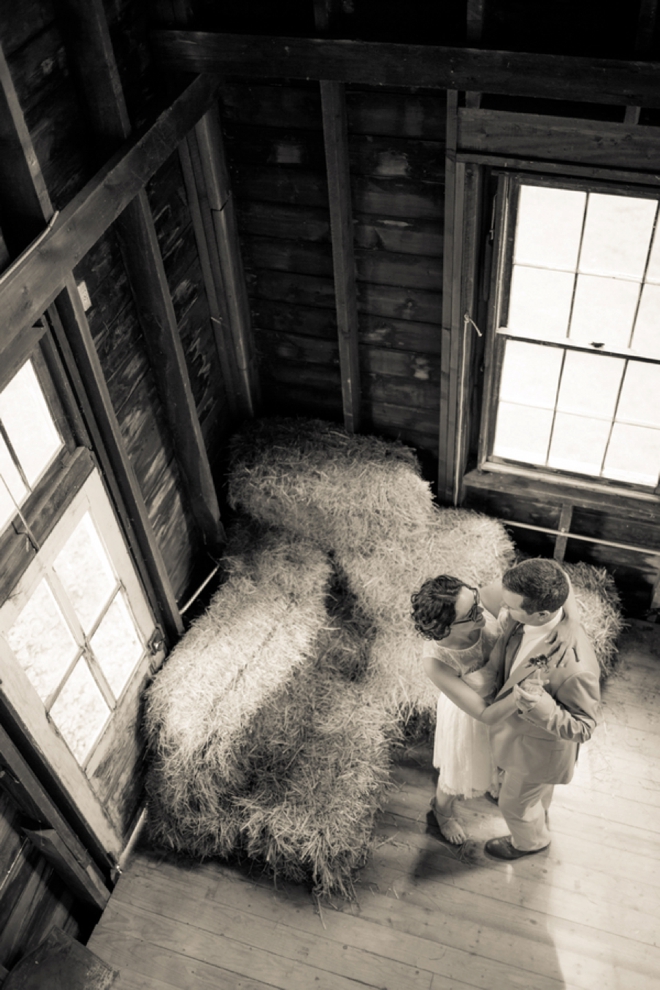 Bride and groom in barn