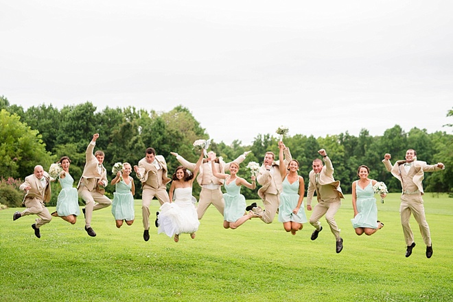 bridal party jumping for joy