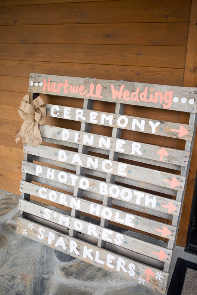 Wedding directional sign painted on a wood pallet!