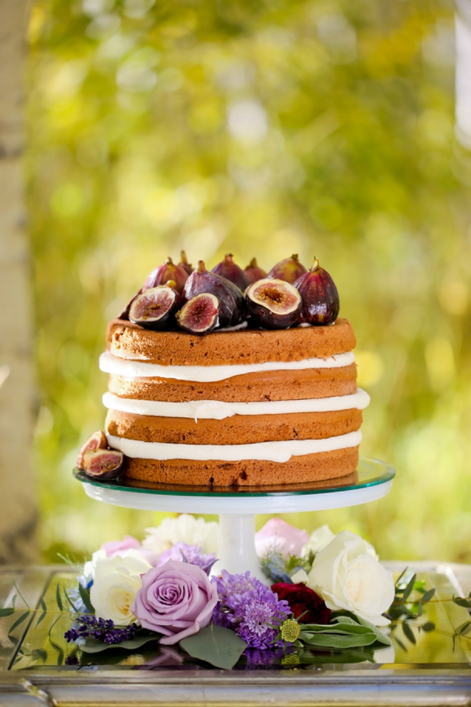 Naked wedding cake with beautiful figs on top