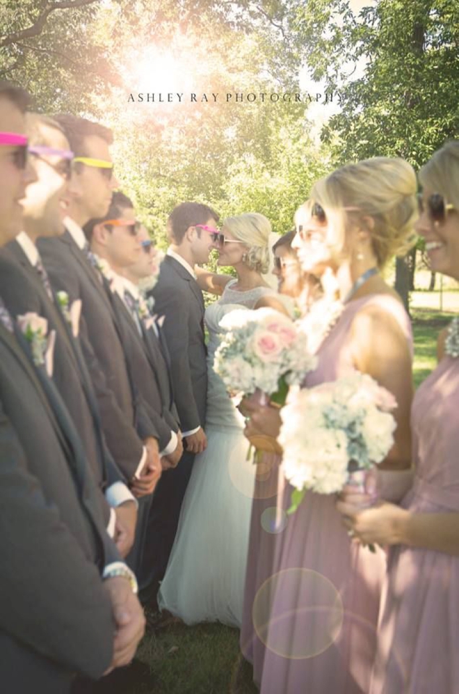 Bridal party in the sun wearing fun sunglasses