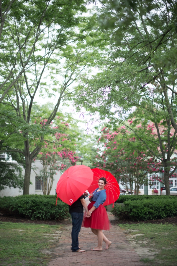 Red heart umbrellas in engagement