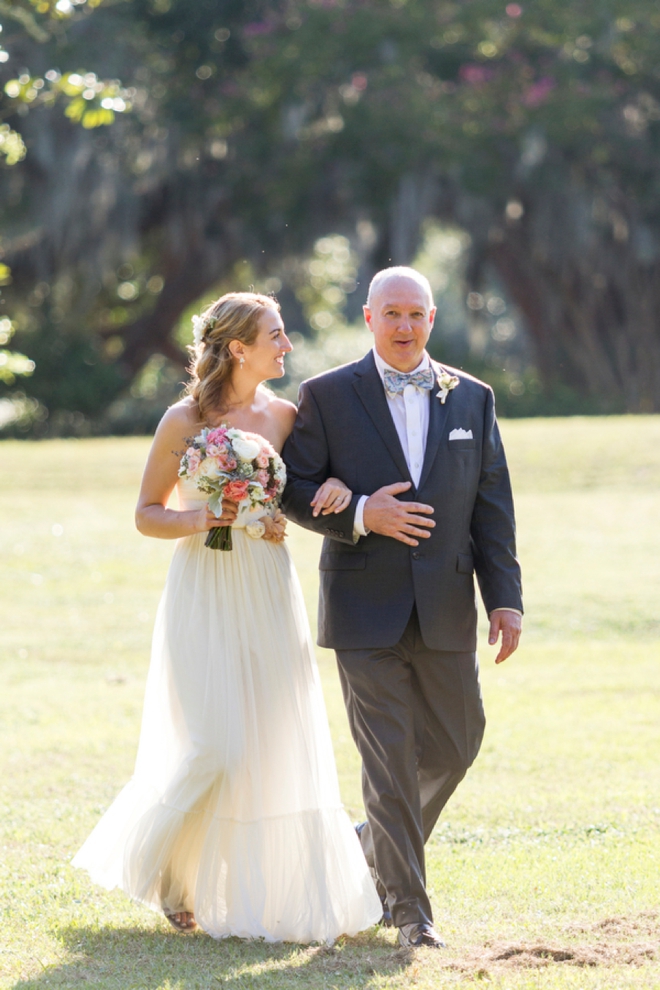 Bride walking with her father