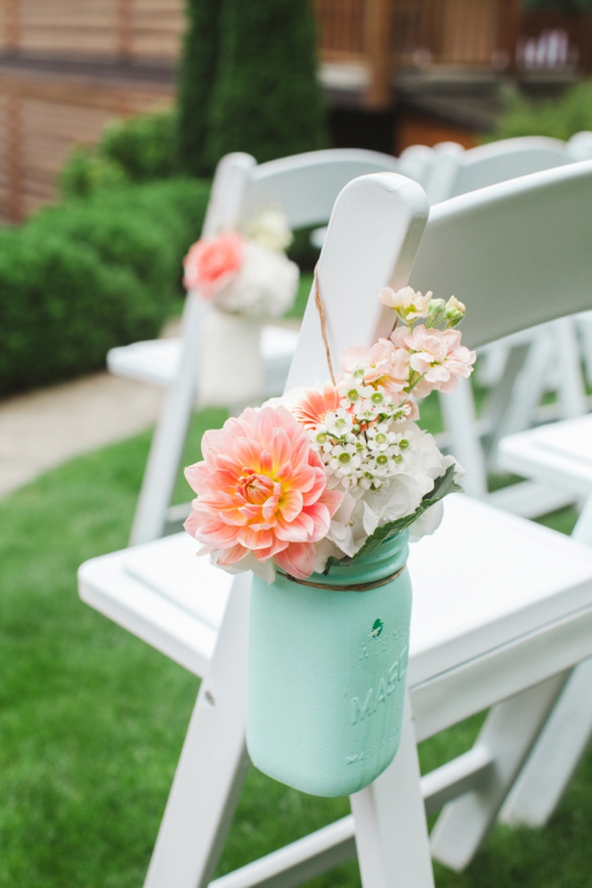 Turquoise mason jar aisle decor