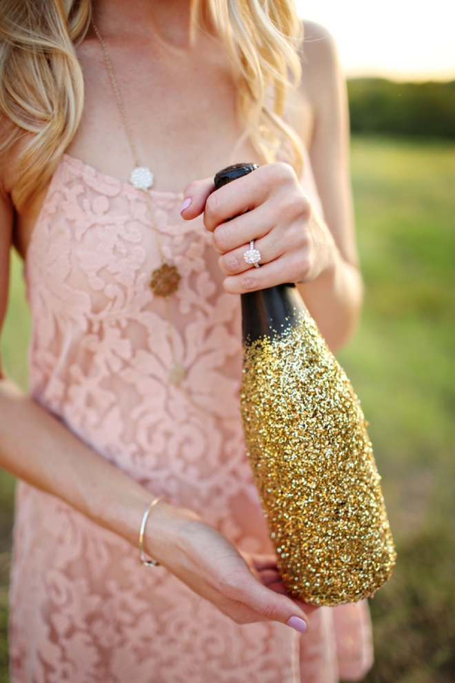 Glitter covered champagne bottle