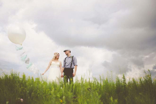 Bride and groom with balloon