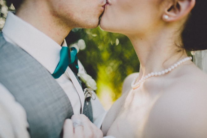 Turquoise bow tie and kiss