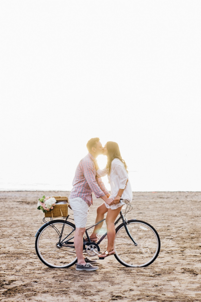 Engagement kiss on a bike