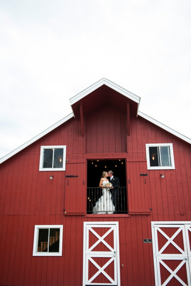 Bride and groom portrait in a barn