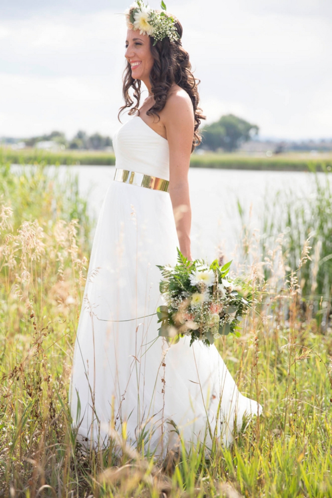 Gorgeous bride with a stunning gold belt