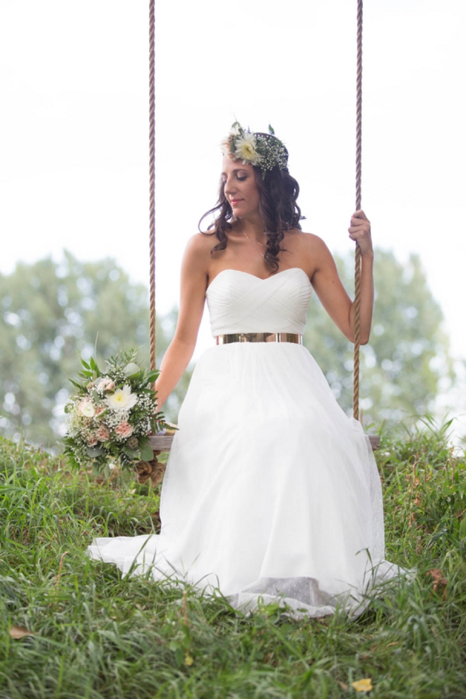 Gorgeous bride on a swing