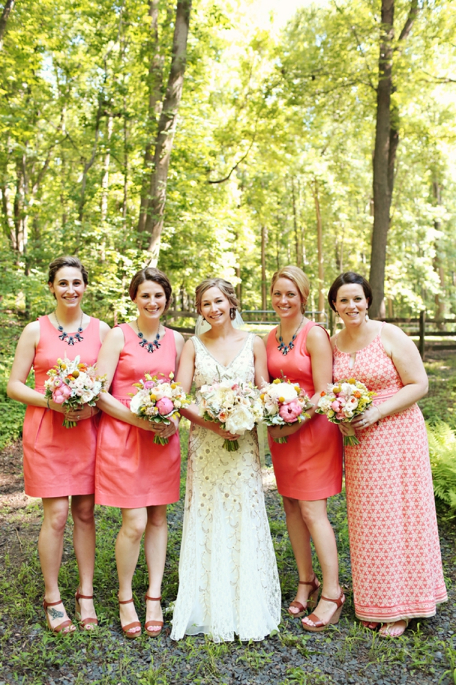 Bride and her coral bridesmaids