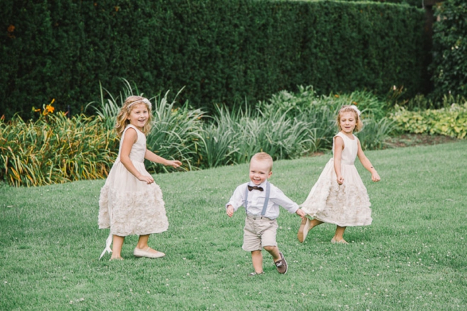Flower girls and ring bearers playing