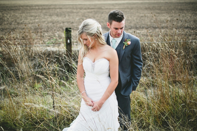 Bride and groom in a field