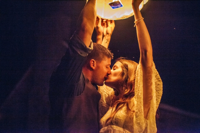 Lighting paper lanterns at the reception