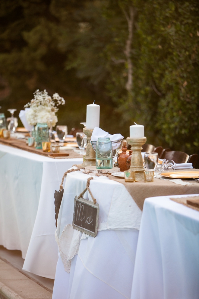 Outdoor wedding reception around a pool