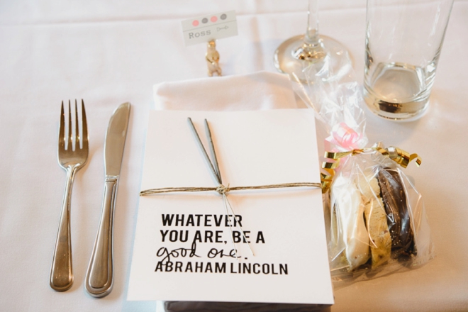 Gold and pink wedding tablescape with love quotes