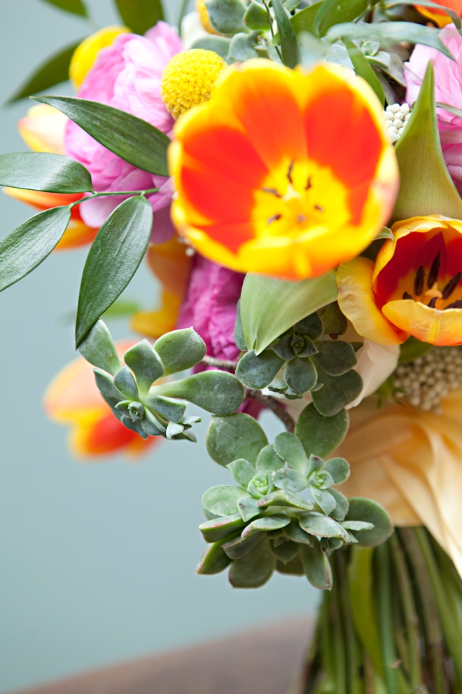 Gorgeous, garden inspired DIY wedding bouquet with tulips, ranunculus and succulents