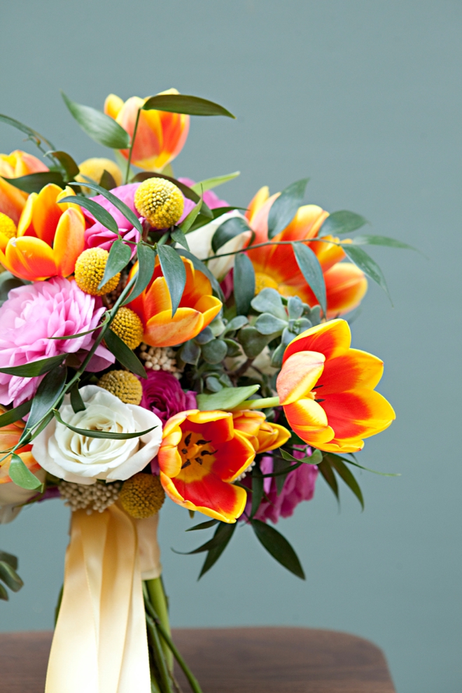 Gorgeous, garden inspired DIY wedding bouquet with tulips, ranunculus and succulents