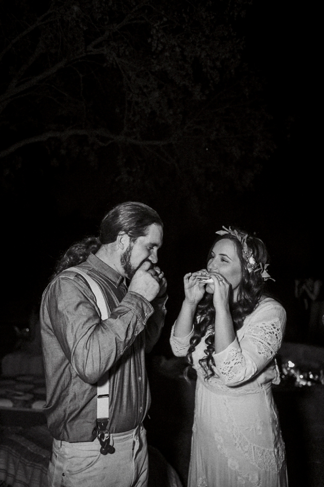 Bride and groom enjoying s'mores