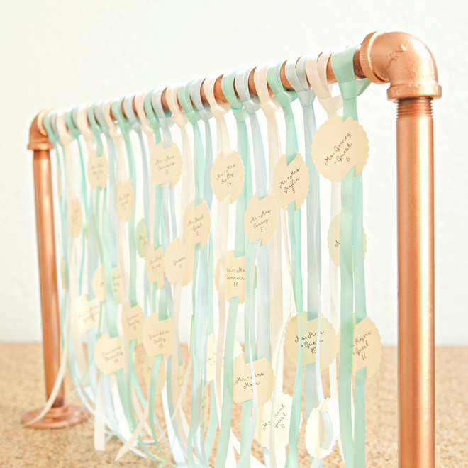 Awesome, DIY galvanized pipe escort card display!