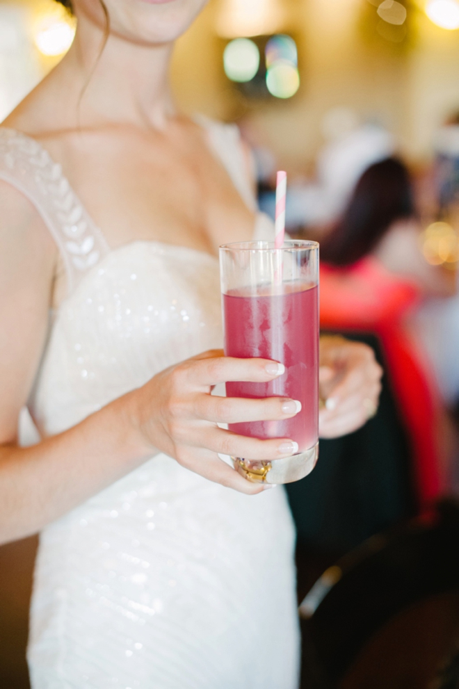 Bride with pink wedding cocktail