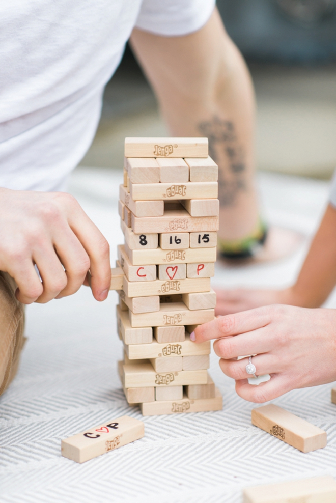 Adorable engagement session with jenga