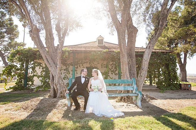 Bride and Groom on park bench