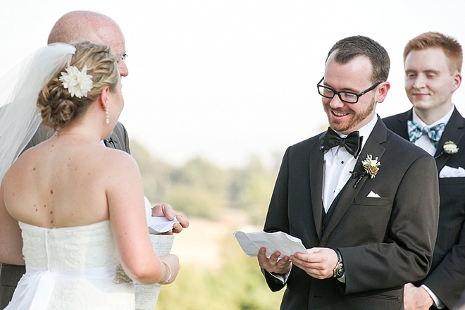 Groom reading his vows