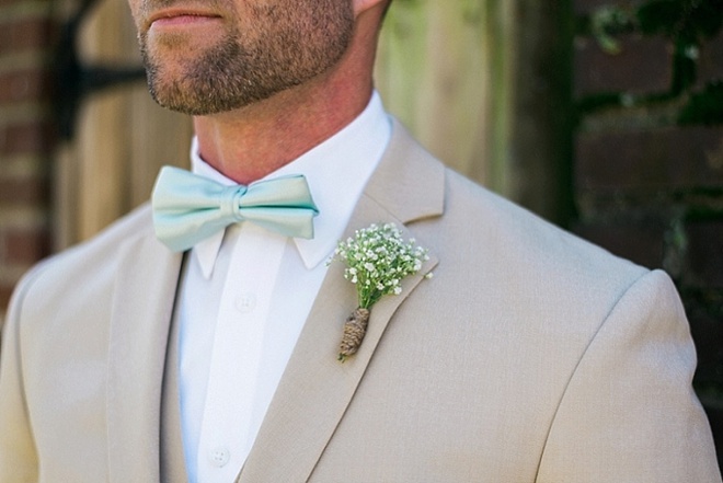 Mint bow tie and baby's breath boutonniere