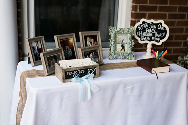 Guest book and program table for a backyard wedding
