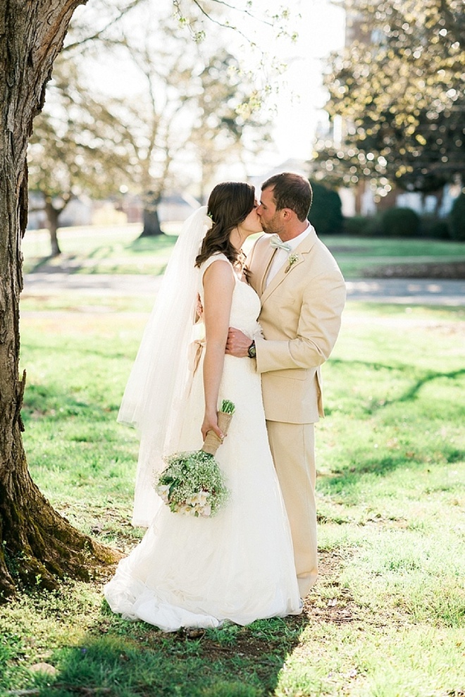 Gorgeous bride and groom, during their backyard wedding